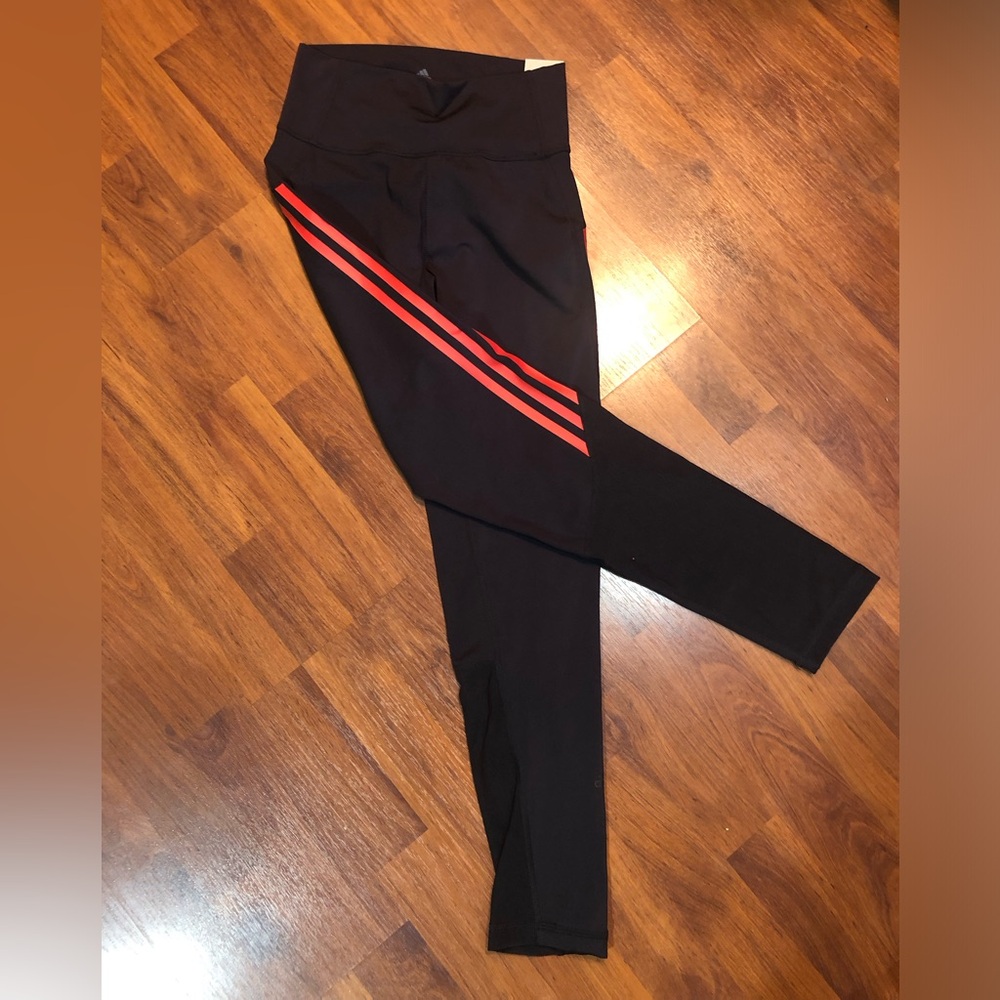 NWT Adidas 7/8 Length Leggings. Size small. Dark blue with red stripes.